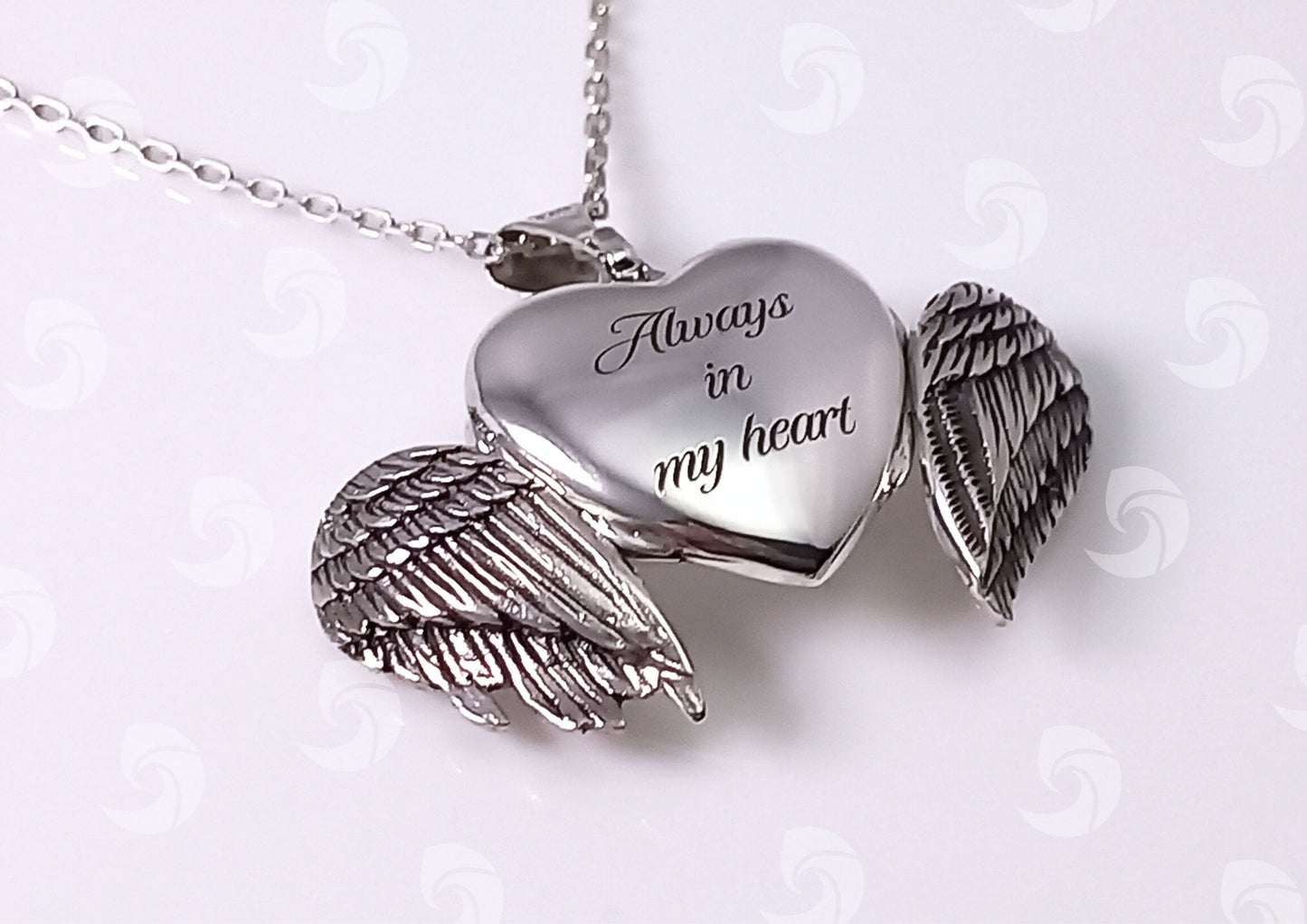 Breaking Waves Cremation Jewellery Angel Wings Heart Shape Sterling Silver Necklace with engraving on the back of a heart